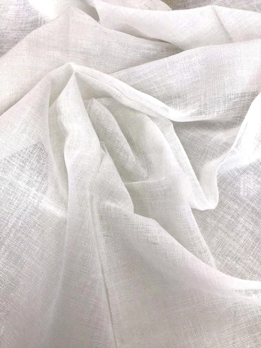 Primo piano della trama di un tessuto bianco effetto lino.